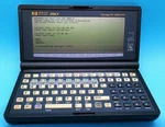 Vintage Hp 200LX Handheld Graphic Display Pc Palmtop 2MB Powers On. Fixed Price $159.97.