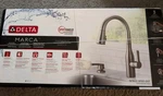 Delta Marca Pull-down Sprayer Kitchen Faucet With Shield Stainless. Fixed Price $179.99.