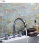 Vola KV10-40 Three Hole Deck Mount Kitchen Faucet Stainless Steel. Fixed Price $1295.00.